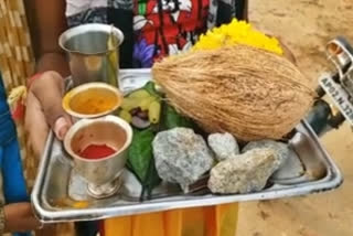 Devotees offer stones to deity at Andhra temple