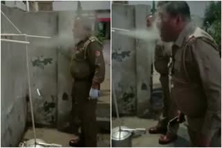 Policemen inhale steam