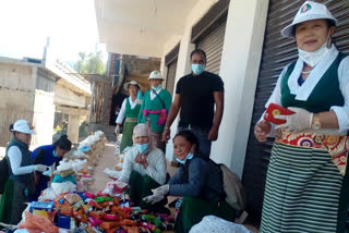 Women's wing distributed rations and clothes to the poors in Jahu