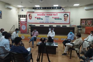 Satish Poonia meeting, BJP Covid Helpline