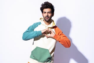 'Don't try this in public', warns Kartik Aaryan as he shares pic without mask