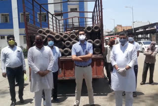 District Collector and MLA Nilaya Daga with Oxygen Cylinder