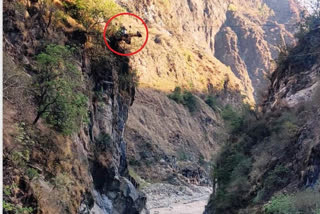 JCB hanging to cables on Alakananda river