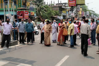 Senior citizens protest outside Alipurduar Municipality Primary Health Center for not getting covid vaccine