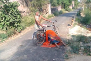 Dead body on bicycle