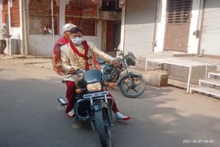 Bride and groom running on bike