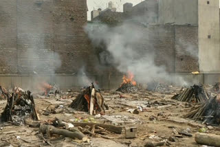 cremation at open ground in seemapuri cremation ground