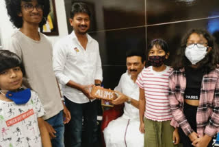 Udhayanidhi celebrates by gifting AIIMS brick to MK Stalin