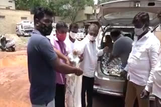 distributes food packets to Corona Warriors at Gadag