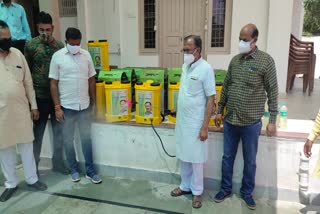 distribution of sanitizing machine, seva hi sangathan
