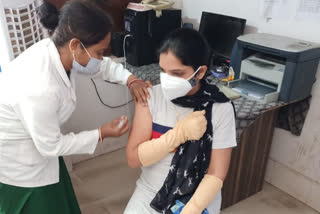 Youth excitedly getting corona vaccine