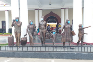 Statues in Mysuru Railway station creates awareness about Corona