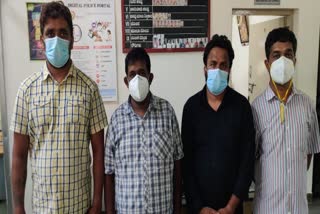 four lab technician arrested