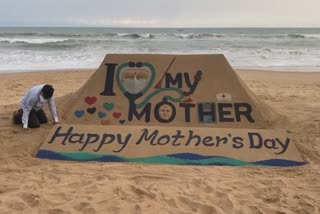 beautiful sand art by sudarsan pattnaik on the occasion of mother's day