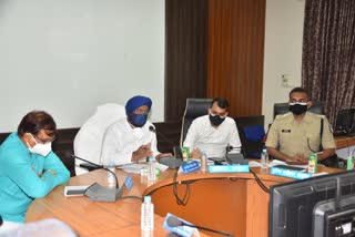 Minister Hardeep Singh Dung taking the meeting