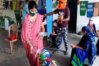 mask and sanitizer provided to women of self help group