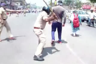 Police Lathi charge