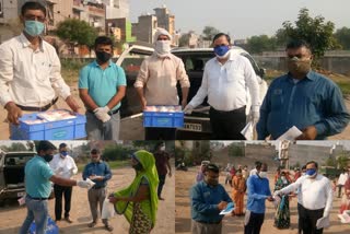 social workers distributing milk during lockdown