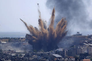 Israel begins firing artillery and tank shells into Gaza