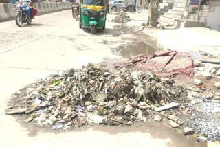 drain debris on the road in devli