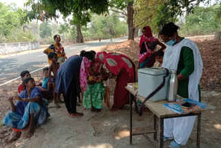 Health Department team making villagers aware about corona and vaccination