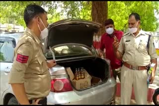 17 cases of illicit liquor seized from Honda City car, accused escaped