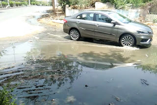Sewage dirty water deposited on the roadside in Dwarka in Delhi