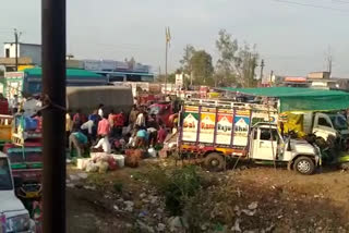 Crowd gathered in fruit market