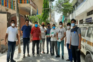 bjp leader distributed steamer and face shield