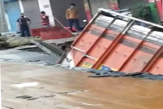A truck fell into a caved in portion of road in Najafgarh
