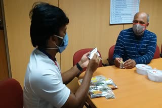 Volunteers of the Red Cross  taking Ayurvedic medicine