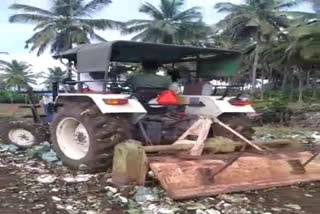 destroying-the-cabbage-crop-using-a-tractor-in-erode