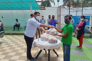 relief distribution at amoguri among small businessman