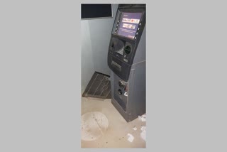 two arrested for breaking into atm and stealing