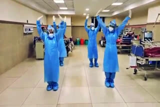 doctors-dance-for-covid-patients-with-ppe-kit