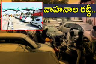 Heavy vehicles parked at the toll plaza