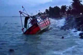 A fishing boat that crashed into the sea shore in Ullal