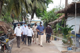 mla spraying chemicals in villages