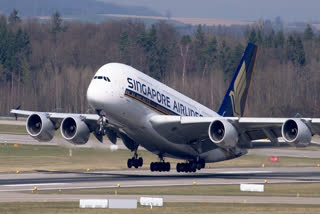 COVID impact: Singapore Airlines report record full year loss of USD 3.21 billion  കൊവിഡ്: സിംഗപ്പൂർ എയർലൈൻസിൻന്‍റെ നഷ്ടം 3.21 ബില്യൺ യുഎസ് ഡോളർ  സിംഗപ്പൂർ എയർലൈൻസ്  കൊവിഡ്  Singapore Airlines  COVID