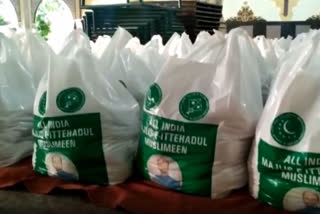 mim distributes food to the poor in hydrabad