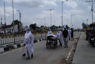 Dead body on handcart