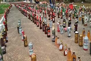 Andhra Pradesh police destroys illegal liquor bottles seized during raids