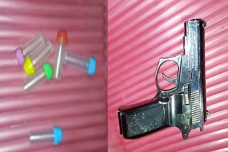 Pistol_and_empty_drugs_container_Recoverd_at_rupohihat