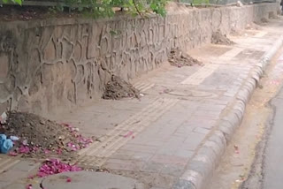 Dirt piles in front of Qutub Minar metro station south delhi