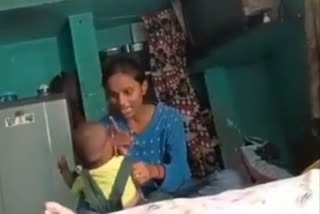 mother beats baby