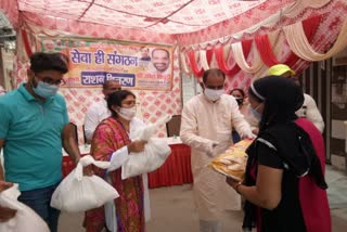 delhi bjp distributes dry ration kits in delhi