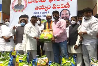 Distribution of rice to the poor under the auspices of Dasoju Foundation at Gandhi Bhavan, Hyderabad