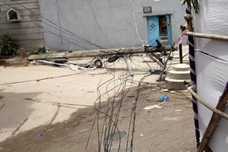 power pole collapsed in indiranagar colony, danger ahead with high tension wires