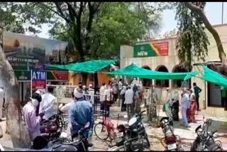 Crowd outside bank