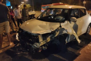 car overturned after hitting red light